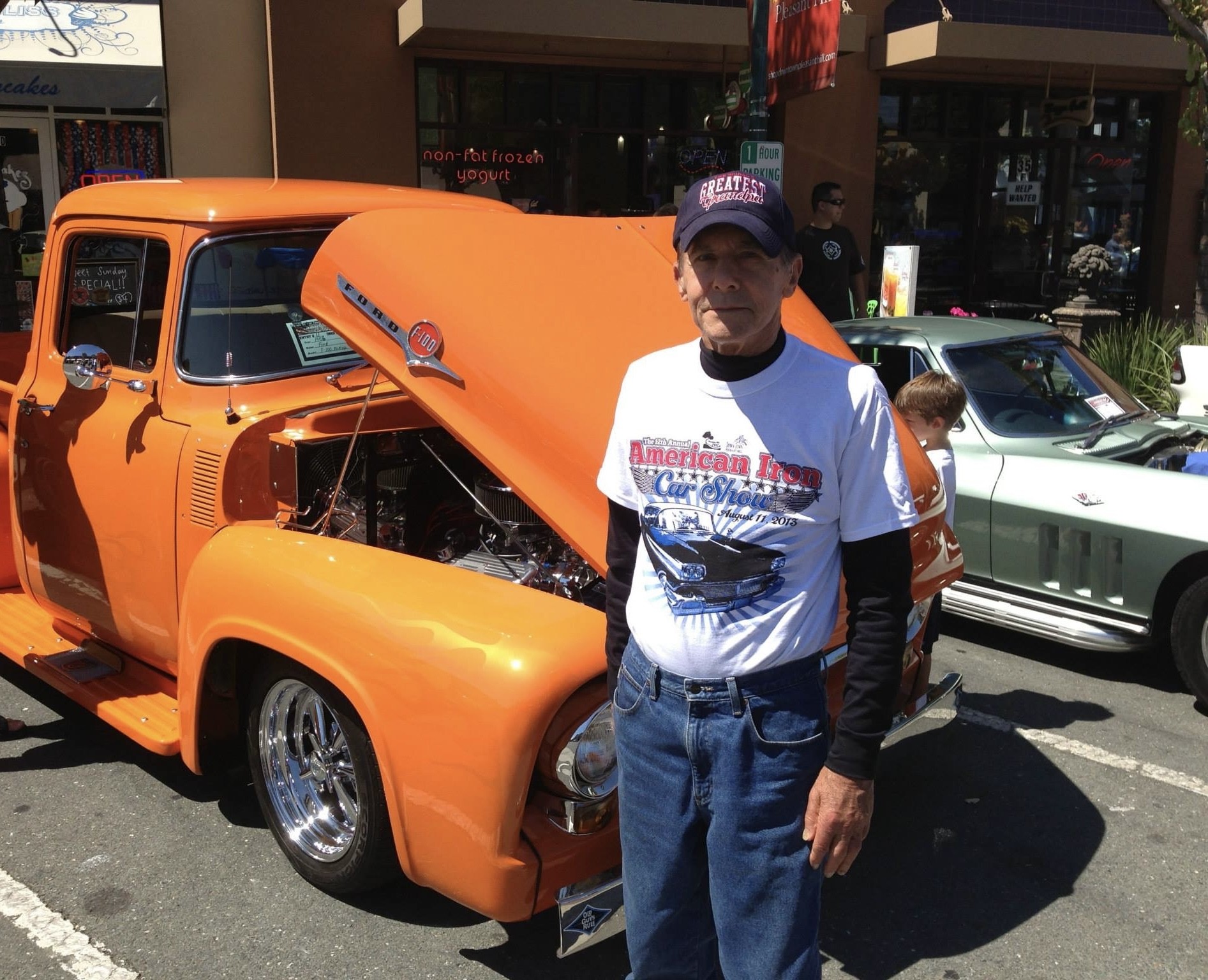 Family automotive photograph with a vintage Ford pickup